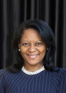 Headshot of Angela Watkins Gailliard, NCC Board of Trustees, with black background